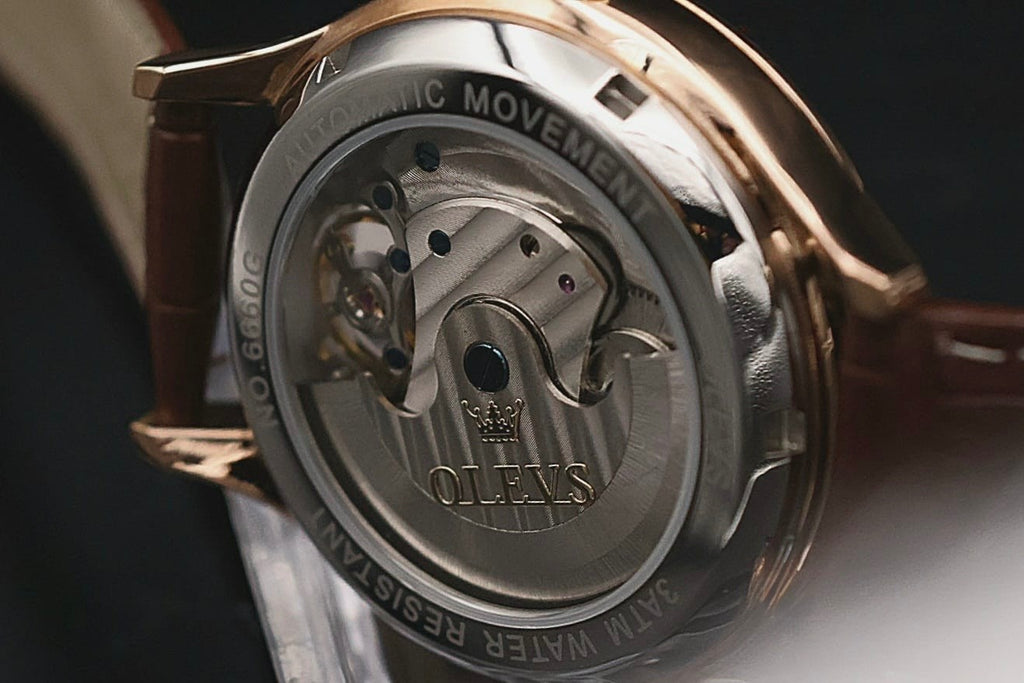 OLEVS Unisex Herren Damen Uhr Automatikuhr Weiß Rosé Braun Farben - offene Unruh3