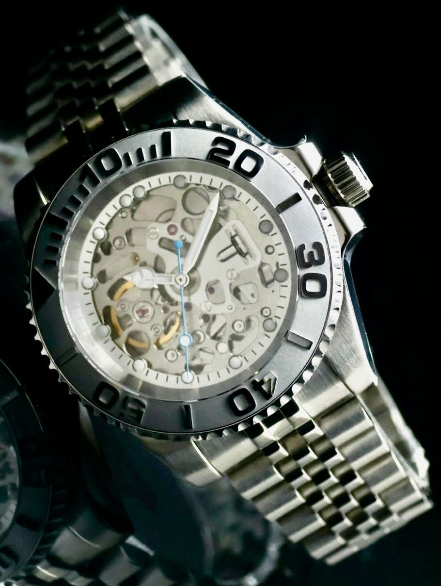 NH70A - SKELETT - AUTOMATIK - UHR- 42 MM - LEUCHTZEIGER - DREHBARE LÜNETTE0